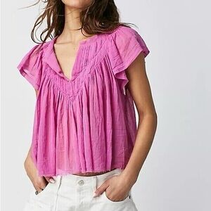 Free People One Padma Top Small
Pink Flutter Sleeve Ruffled Blouse